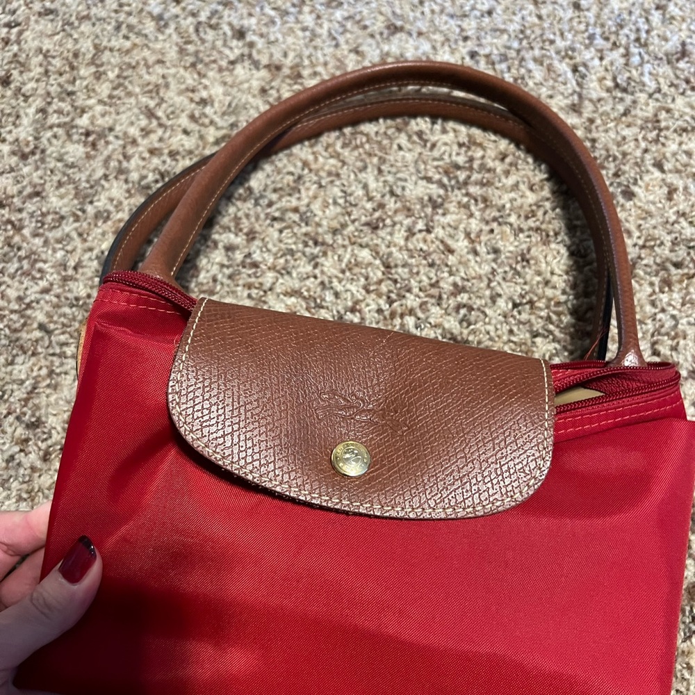 Large Longchamp Red  Tote Bag

12.2 in x 11.8 in (H) x 7.5 in (W)